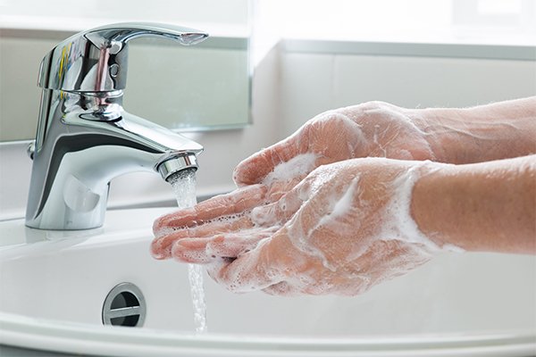 Tvätta händerna noga för att slippa influensa
