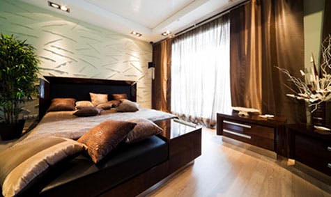Farge- og materialvalget er viktig i det lukseriøse soverommet.